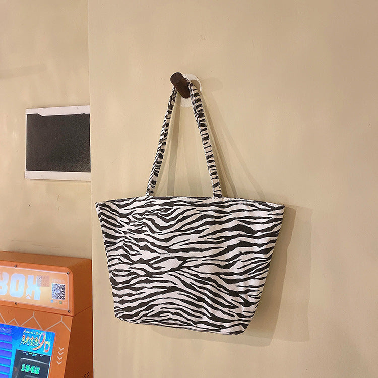 Design zebra-striped tote bags